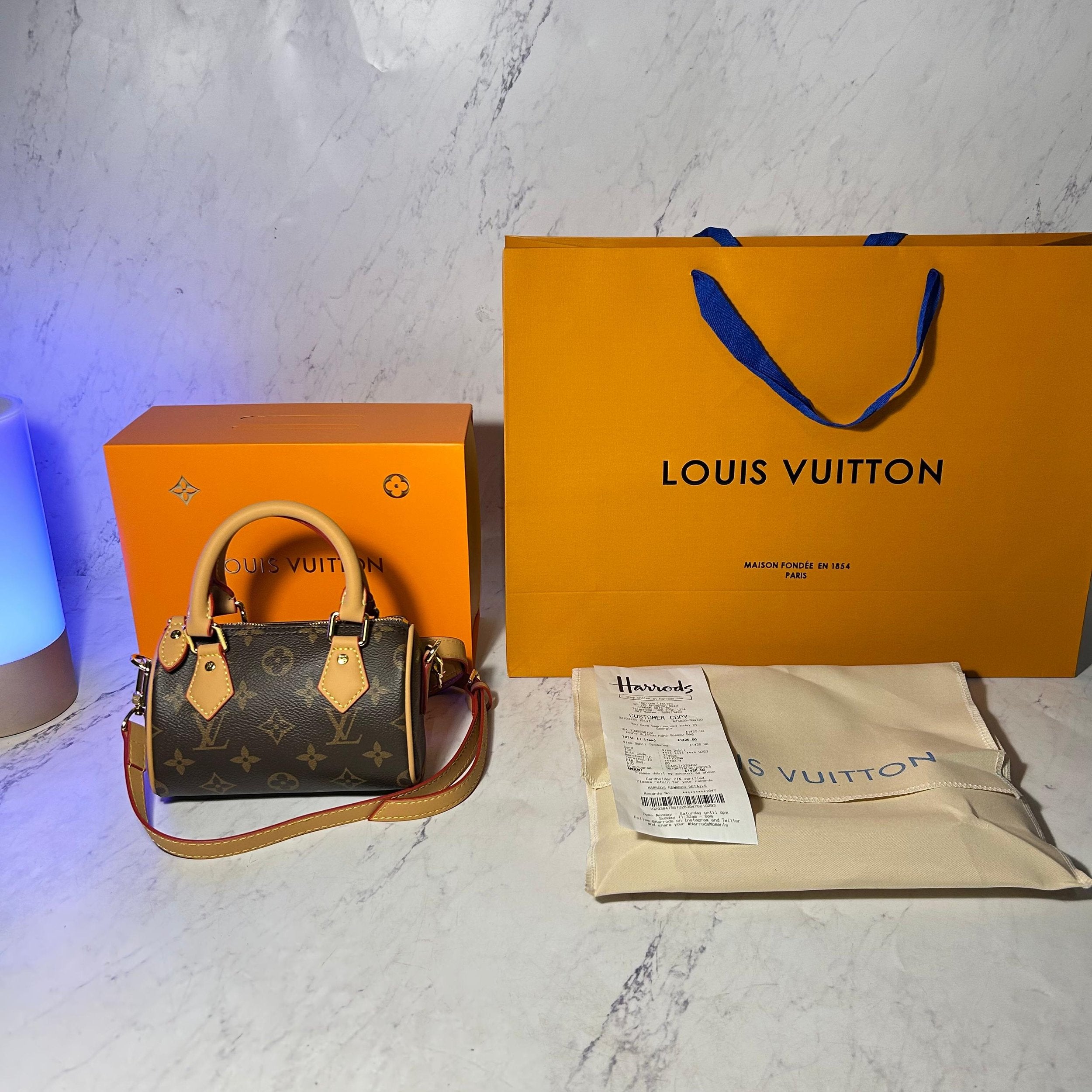 LV NANO SPEEDY HANDBAG